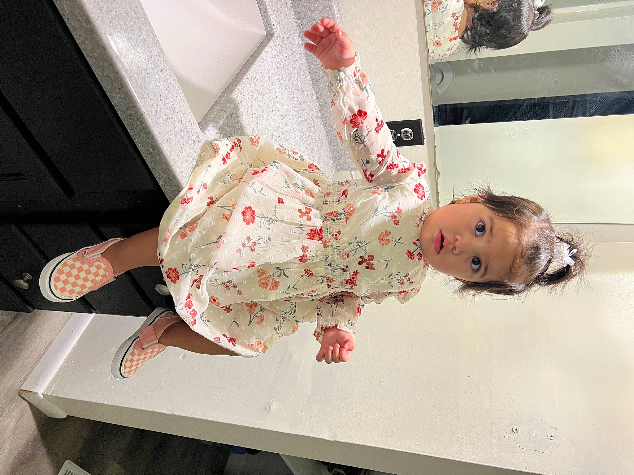 Graciela is registered to the contest to win money with this photo: baby_toddler_clothing, carmine, child, costume, elbow, event, fashion_design, flesh, flooring, foot, fun, human_leg, pattern, person, room, sandal, surprise, thigh, toddler, wrist