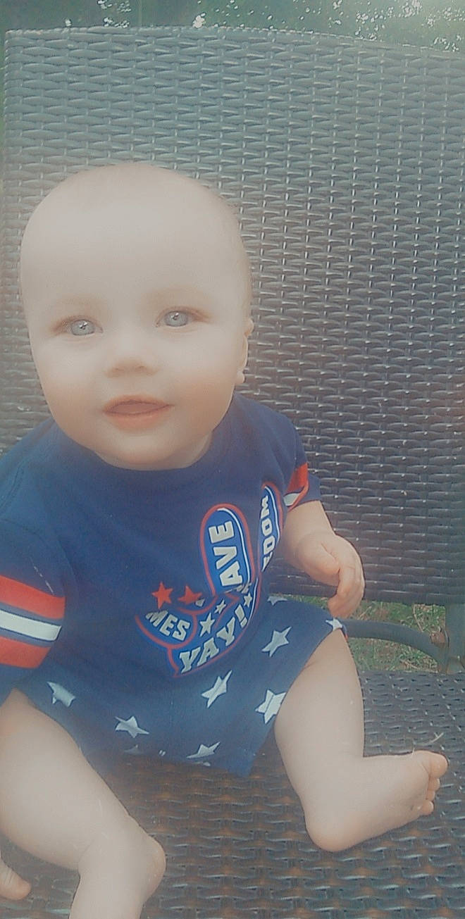 Bryson is registered to the contest to win money with this photo: arm, baby_toddler_clothing, chin, eye, eyebrow, hair, hairstyle, happy, human_body, iris, leg, lip, mouth, muscle, neck, person, shoulder, skin, sleeve, standing