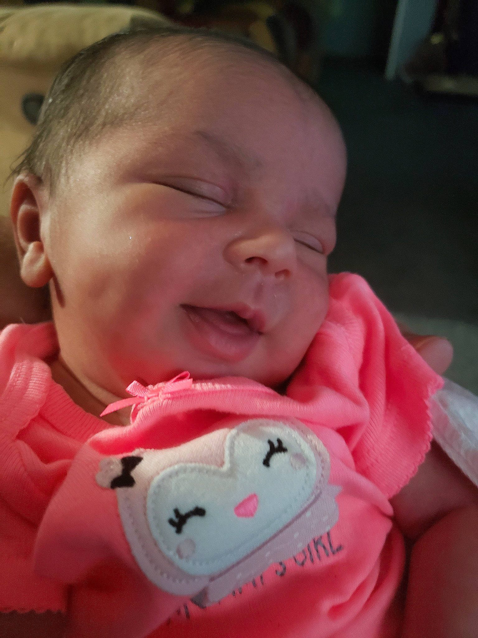 Carly is registered to the contest to win money with this photo: baby, cheek, child, face, head, lip, mouth, nose, person, pink, skin, smile, toddler