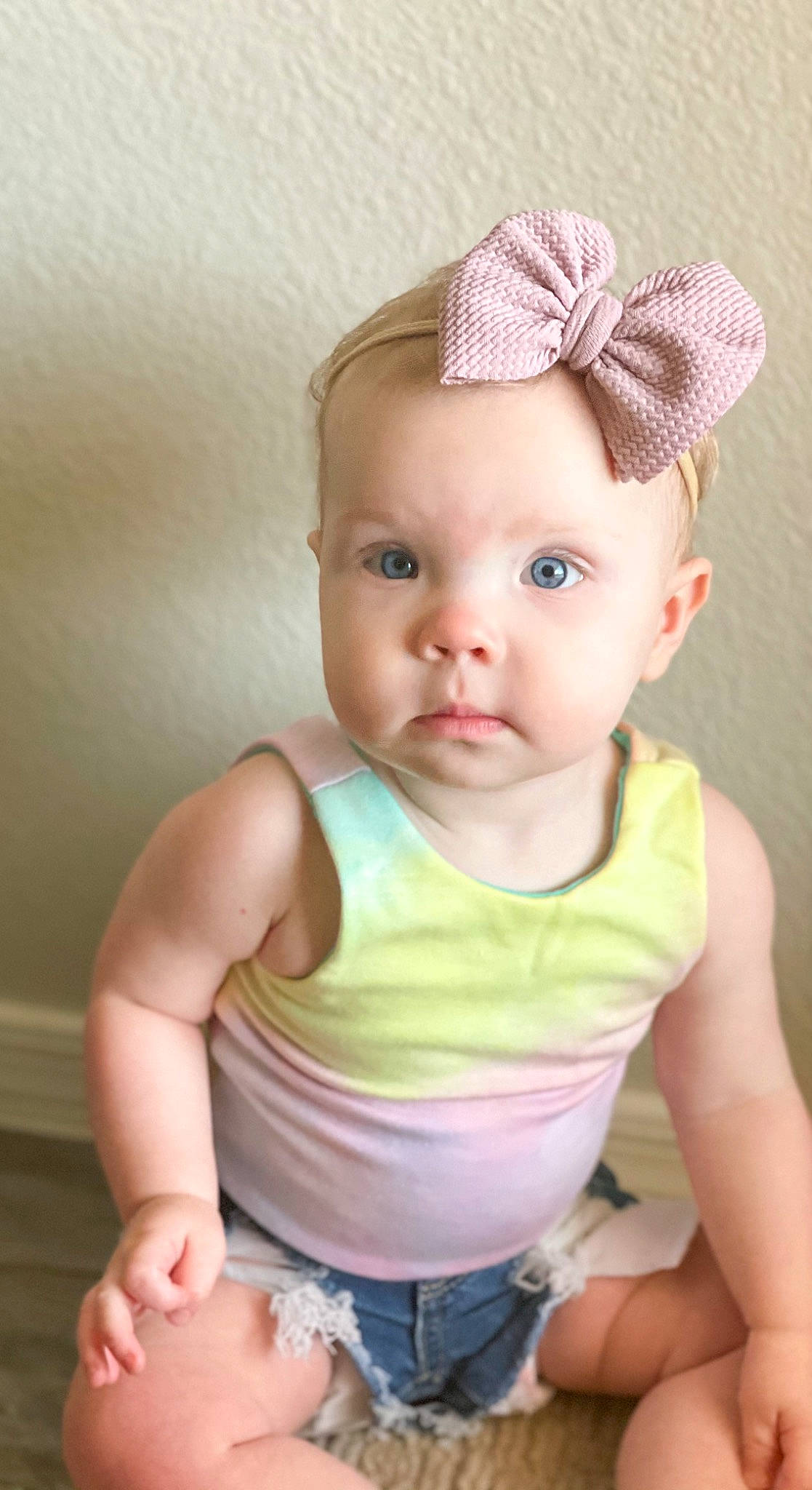 Alayah is registered to the contest to win money with this photo: active_tank, baby, baby_toddler_clothing, camisoles, cap, cheek, chin, clothing, eye, facial_expression, finger, hairstyle, iris, lip, neck, person, pink, skin, sleeve, stomach