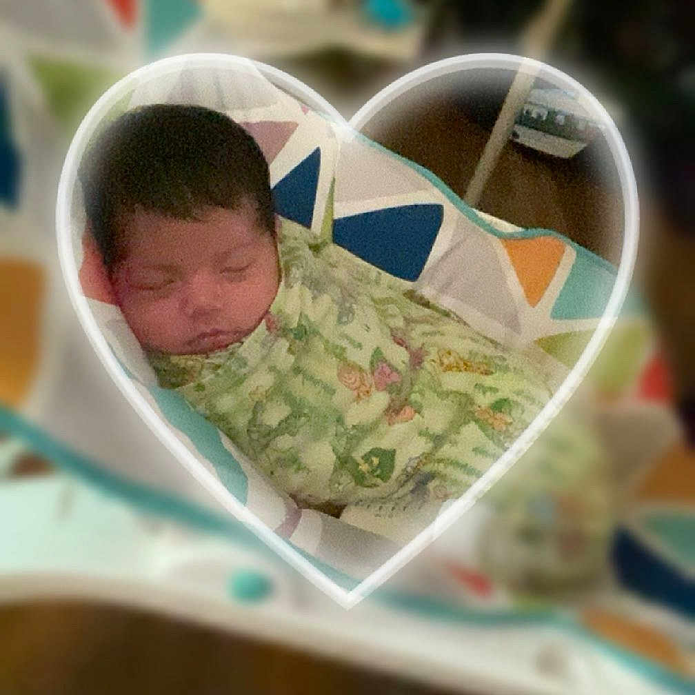 Ardeilla is registered to the contest to win money with this photo: architecture, baby, bed, blanket, building, clothing, cushion, face, furniture, head, heart, homedecor, newborn, person, photography, portrait, quilt, reading, sleeping, t_shirt
