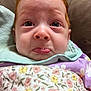 Emery joined the competition — help win amazing prizes! baby, red_hair, pout, close_up, sad_expression, bubble, blanket, floral, pastel_clothing, infant, face, skin, eyelashes, indoors, person, cute, child, portrait, soft_lighting, young