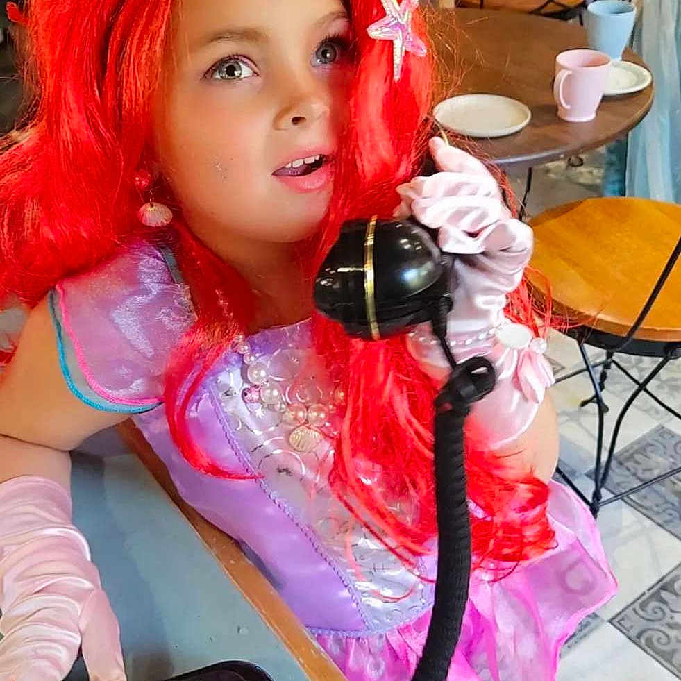 Carli joined the competition — help win amazing prizes! adult, beverage, child, coffee, coffeecup, face, female, girl, hair, head, male, man, person, redhair, woman