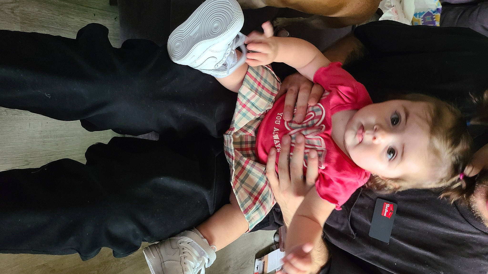 Leighton is registered to the contest to win money with this photo: arm, baby, black, child, cool, elbow, eye, finger, fun, gesture, hand, happy, mouth, nail, pattern, person, plaid, skin, tartan, toddler