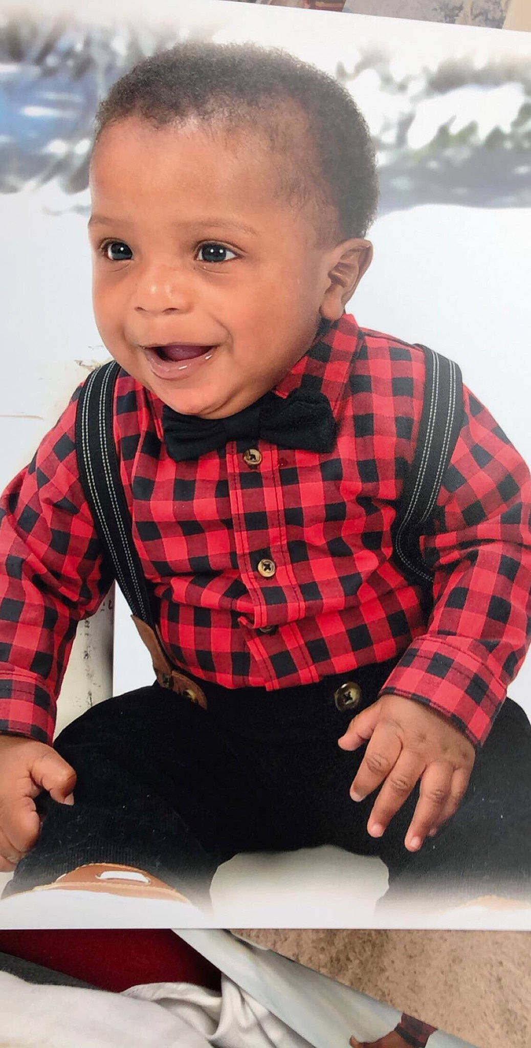 Kazmen is registered to the contest to win money with this photo: boy, child, design, fun, girl, infant, outerwear, pattern, person, plaid, sitting, skin, smile, tartan, toddler