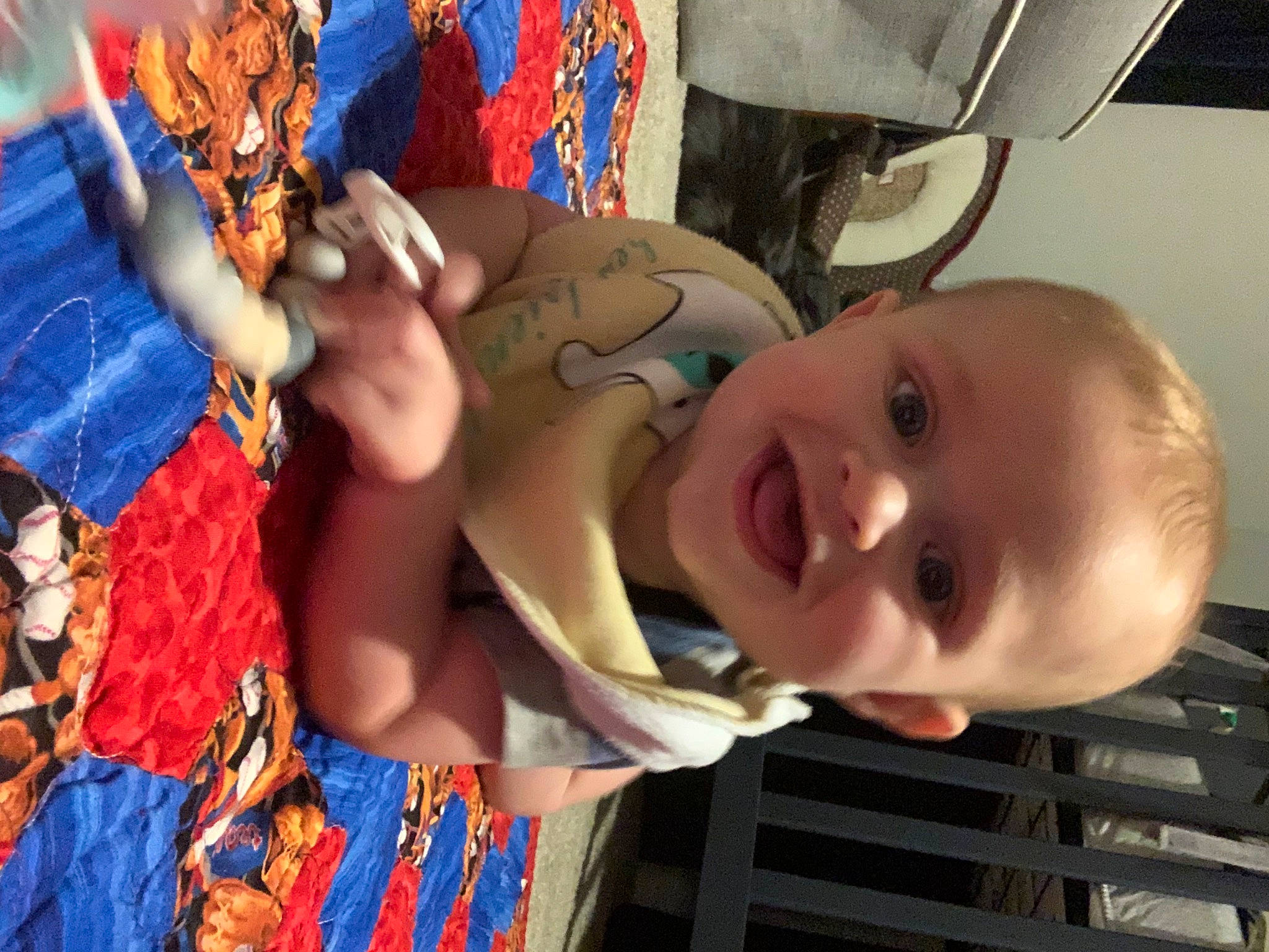 Kade is registered to the contest to win money with this photo: baby, baby_toddler_clothing, blue, child, event, finger, fun, hairstyle, happy, human_body, joy, leisure, mouth, muscle, nose, organ, person, product, skin, smile