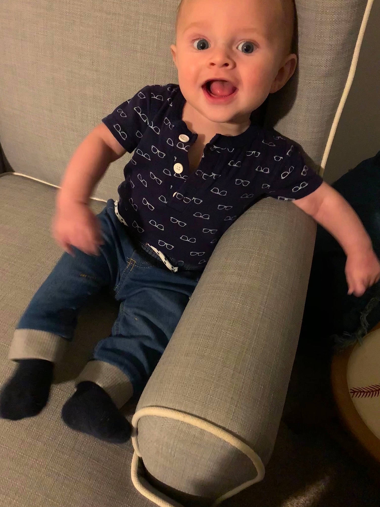 Kade is registered to the contest to win money with this photo: arm, baby_toddler_clothing, comfort, cool, finger, flash_photography, footwear, human_body, joint, knee, leg, organ, person, shoe, shoulder, skin, sleeve, smile, sock, surprise