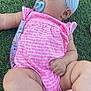 baby, infant, child, pacifier, headband, pink_clothing, elephant_pattern, grass, outdoor, legs, feet, hand, cute, chubby, skin, person, lying_down, summer, daylight, nature
