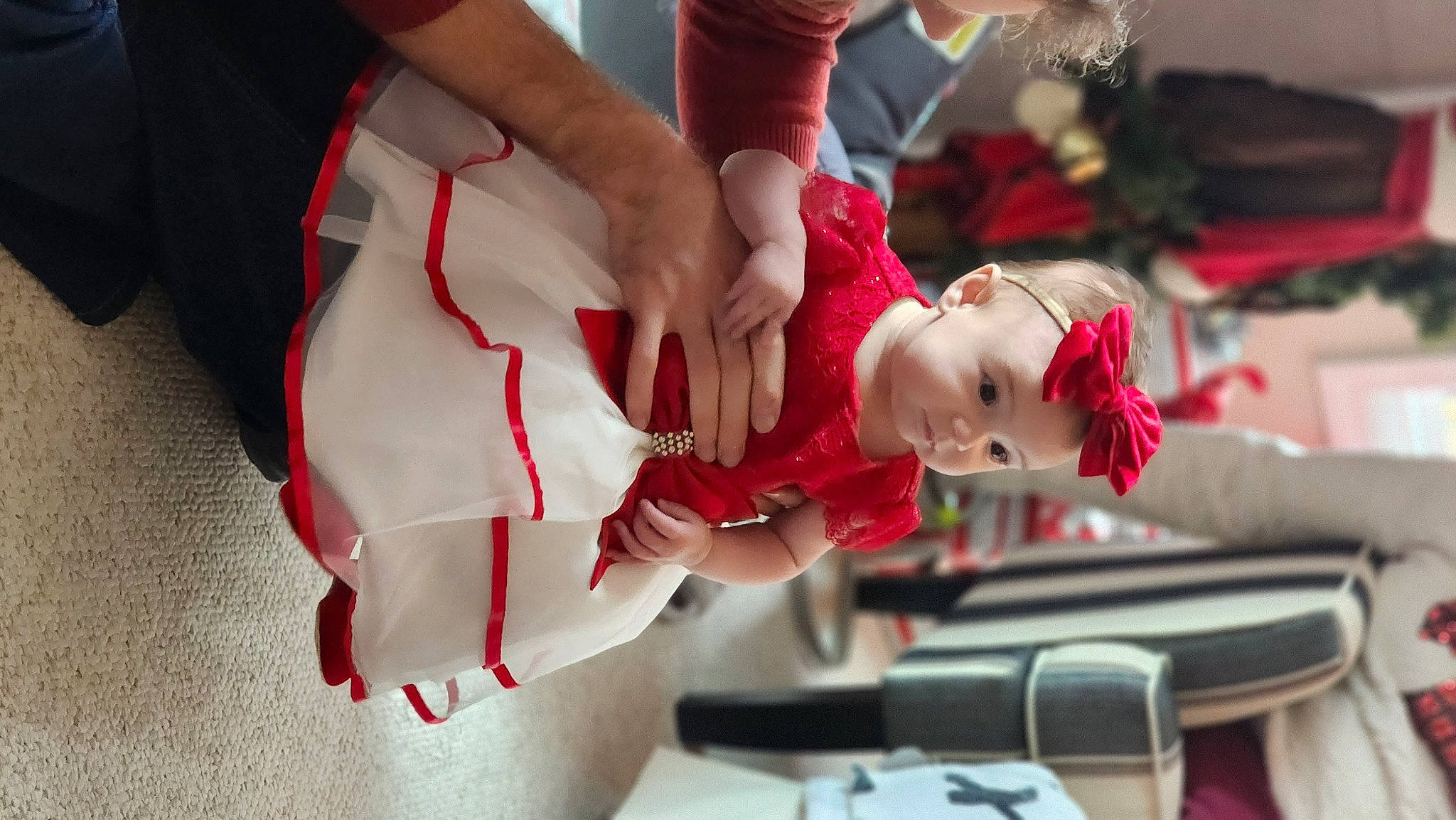 Lilith is registered to the contest to win money with this photo: animation, baby, carmine, child, costume, event, fashion_design, fictional_character, fun, gesture, human_leg, magenta, person, room, sitting, thigh, toddler, toy, tree