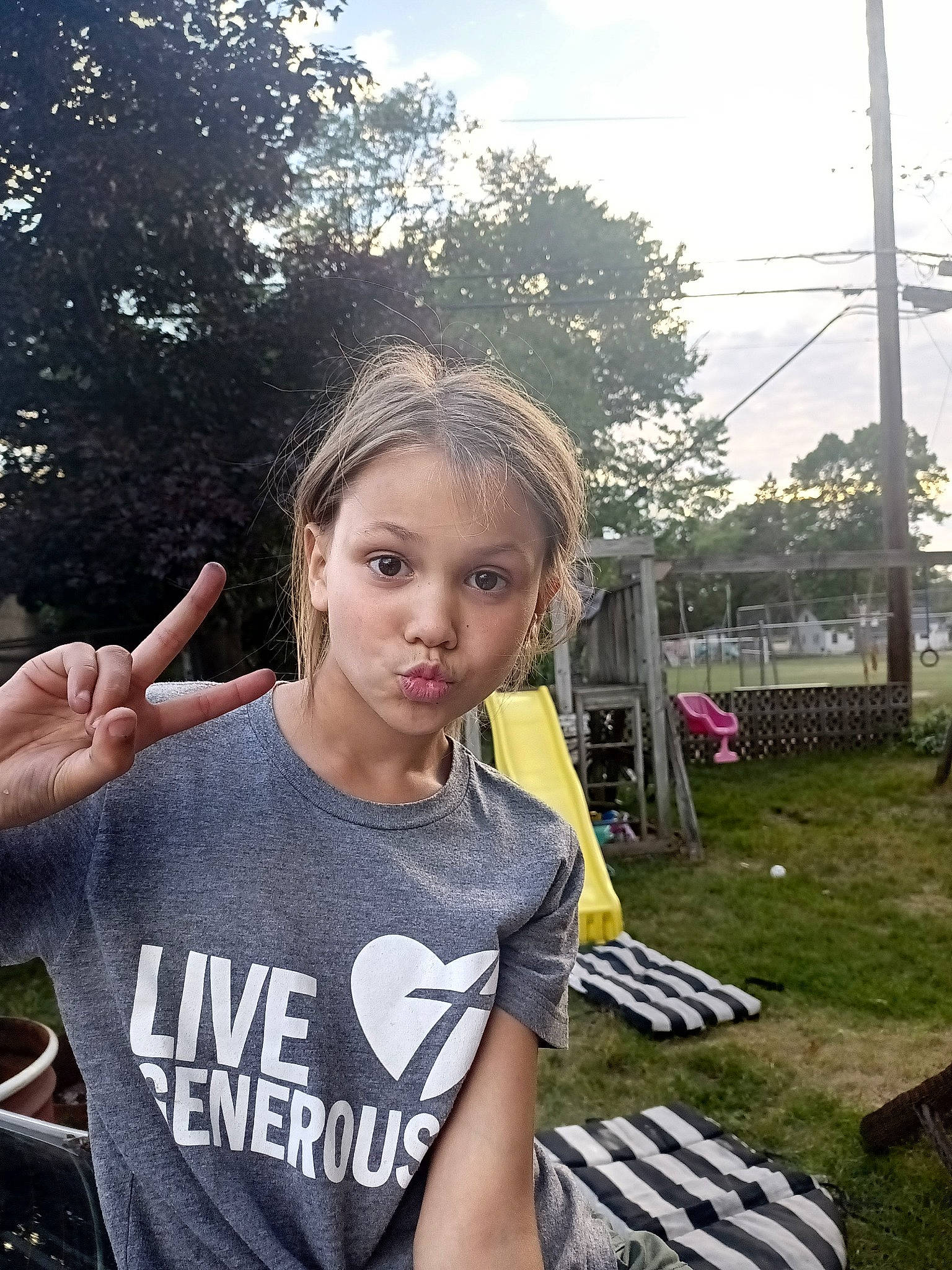 Lilyann joined the competition — help win amazing prizes! cool, event, eyewear, fun, gesture, grass, hairstyle, happy, jewellery, leisure, person, plant, recreation, shoulder, sky, sleeve, spring, summer, t_shirt, tree