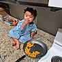 Patience joined the competition — help win amazing prizes! toddler, child, kitchen, countertop, frying_pan, food, diced_food, hair_buns, barefoot, clothing, blue_dress, cooking, indoor, appliance, stove, marble_countertop, snack, curious, young_child, portrait