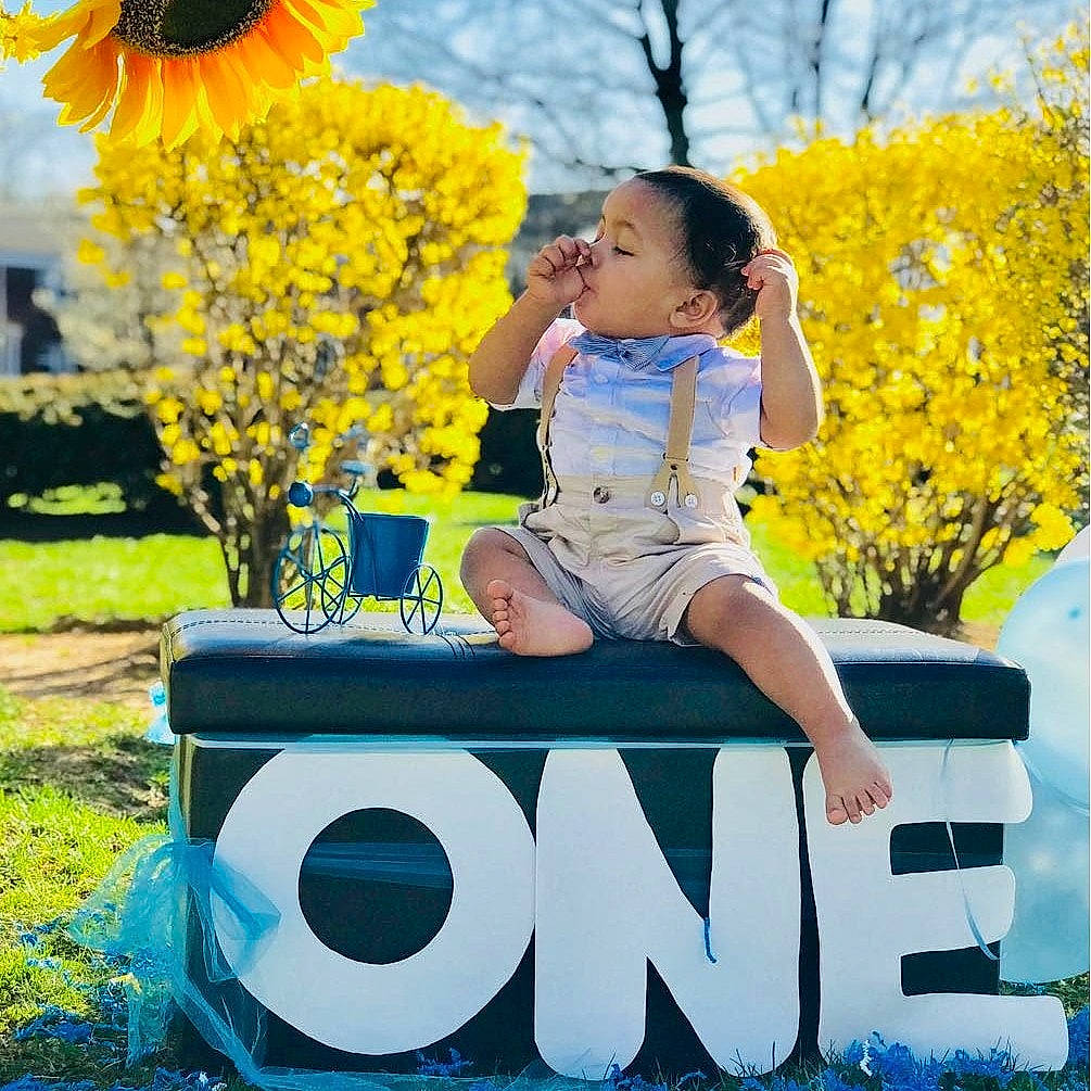 Leandro joined the competition — help win amazing prizes! child, floristry, flower, fun, girl, grass, happiness, leisure, person, plant, play, product, recreation, sitting, smile, spring, summer, sunflower, toddler, vacation