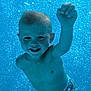 bathingsuit, blue, boy, bubbles, child, cute, diaper, fun, happy, motion, playful, pool, portrait, skin, smiling, summer, swimming, toddler, underwater, water