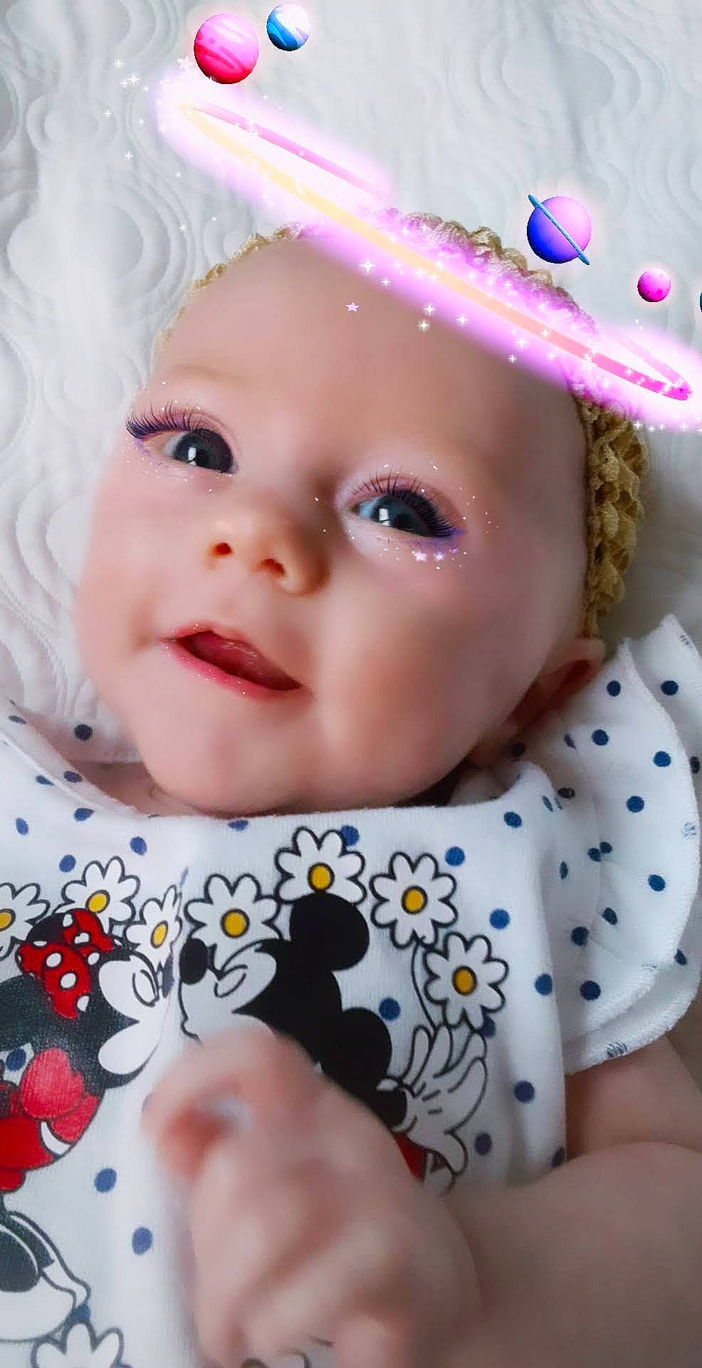 Nova is registered to the contest to win money with this photo: baby_toddler_clothing, cheek, chin, clothing, dress, eye, eyebrow, eyelash, face, facial_expression, hairstyle, head, iris, lip, nose, person, pink, skin, sleeve, textile