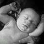 Joey is registered to the contest to win money with this photo: arm, baby, black_and_white, calm, child, close_up, cute, face, fingers, hand, infant, napping, newborn, peaceful, portrait, resting, skin, sleeping, soft_light, tattoo