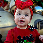 Miracle is registered to the contest to win money with this photo: toddler, child, red_clothing, headband, bow, reindeer, holiday, festive, outdoor, portrait, cute, happy, face, smile, christmas, decoration, background, person, young_child, winter