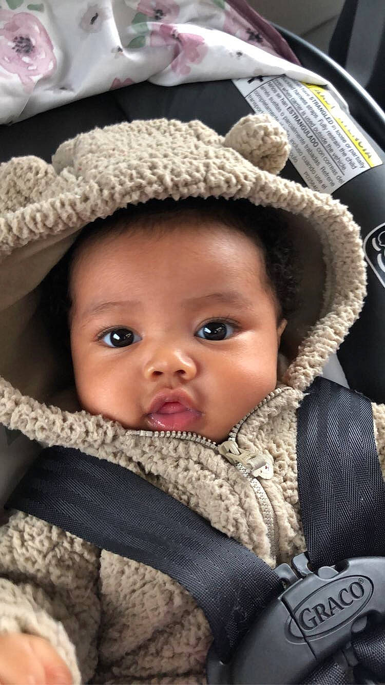 Ayanna joined the competition — help win amazing prizes! baby, baby_carriage, baby_in_car_seat, baby_products, car_seat, cheek, child, hat, headgear, headwear, person, product, skin, toddler, wool