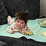 baby, child, tummy, couch, blanket, toy, bee, bottle, hair, curious, indoor, face, person, plush, soft, carpet, clothing, infant, cute, home