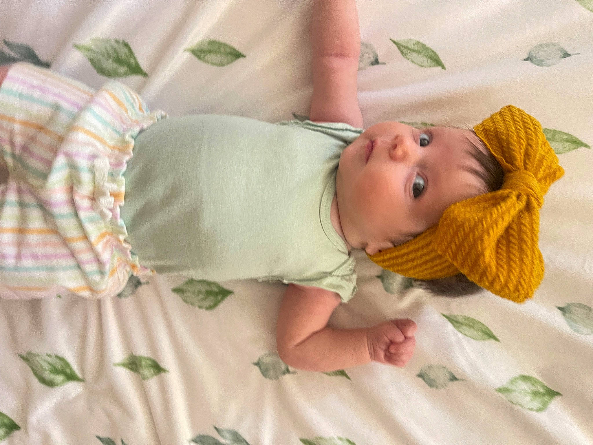 Genevieve joined the competition — help win amazing prizes! baby, baby_products, baby_safety, baby_sleeping, baby_toddler_clothing, bed, bed_sheet, bedding, bedtime, child, comfort, happy, human_body, linens, pattern, person, room, skin, sleeve, textile
