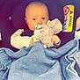 Luca joined the competition — help win amazing prizes! baby, blanket, blue_blanket, car_seat, child, closeup, clothing, cute, face, holding, indoors, infant, pacifier, plush_toy, seatbelt, sitting, soft_toy, star_pattern, stuffed_animal, wrapped