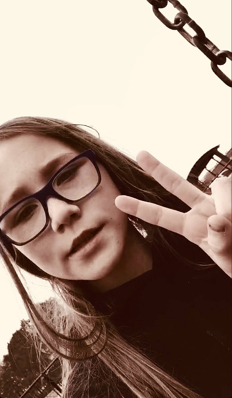Ashlyn is registered to the contest to win money with this photo: audio_equipment, black_hair, brown_hair, eyebrow, eyelash, eyewear, finger, flash_photography, gesture, glasses, hand, happy, jaw, lip, long_hair, monochrome, person, selfie, string_instrument, tints_and_shades