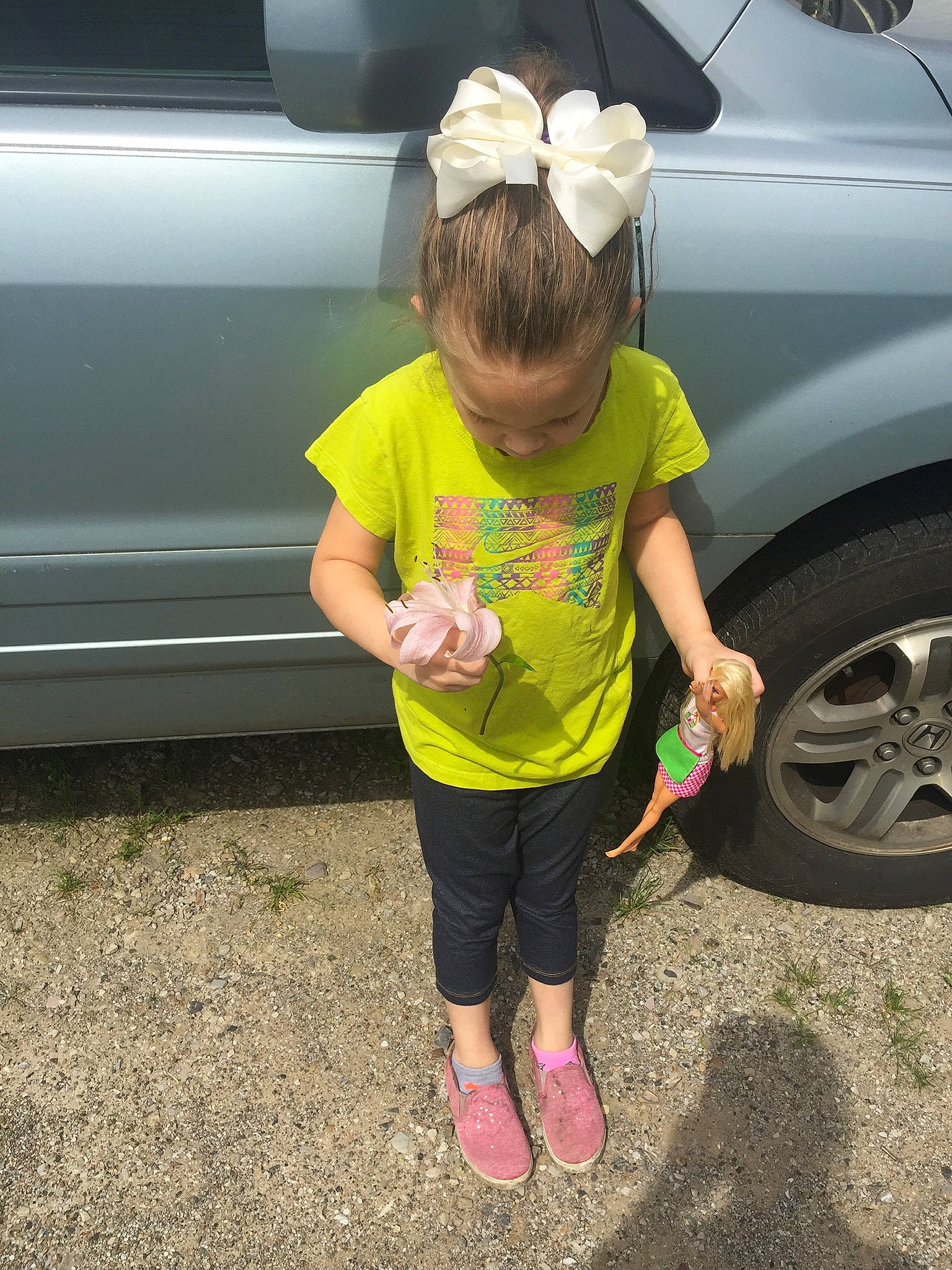 Kayelyn Carlock is registered to the contest to win money with this photo: auto_part, automotive_exterior, automotive_tire, automotive_wheel_system, car, child, family_car, fun, luxury_vehicle, person, plant, play, rim, tire, toddler, vehicle, vehicle_door, wheel