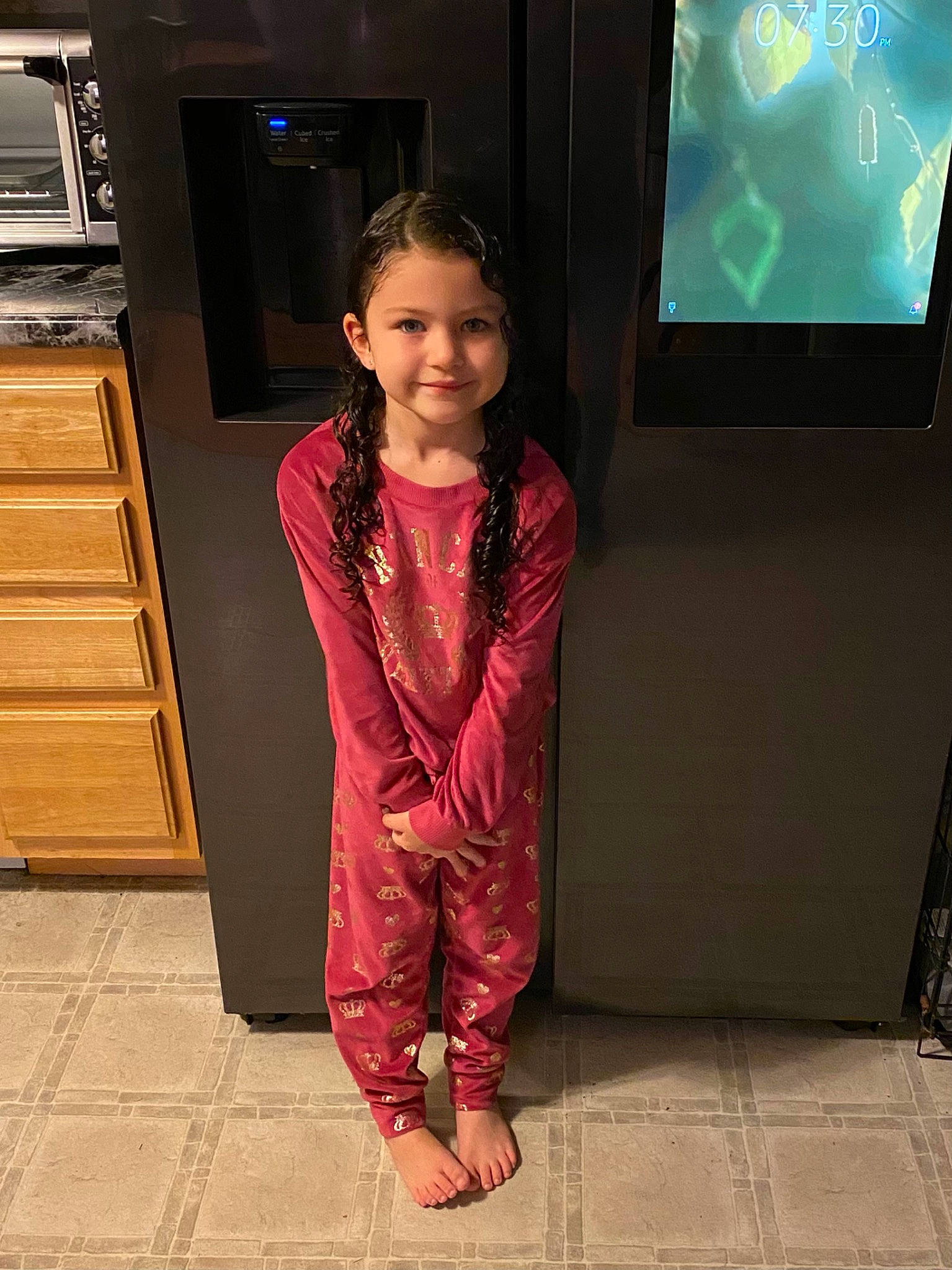 Nyah joined the competition — help win amazing prizes! cabinetry, child, countertop, display_device, flat_panel_display, flooring, formal_wear, fun, home_appliance, human_body, joy, kitchen_appliance, magenta, microwave_oven, person, room, skin, sleeve, smile, television_set