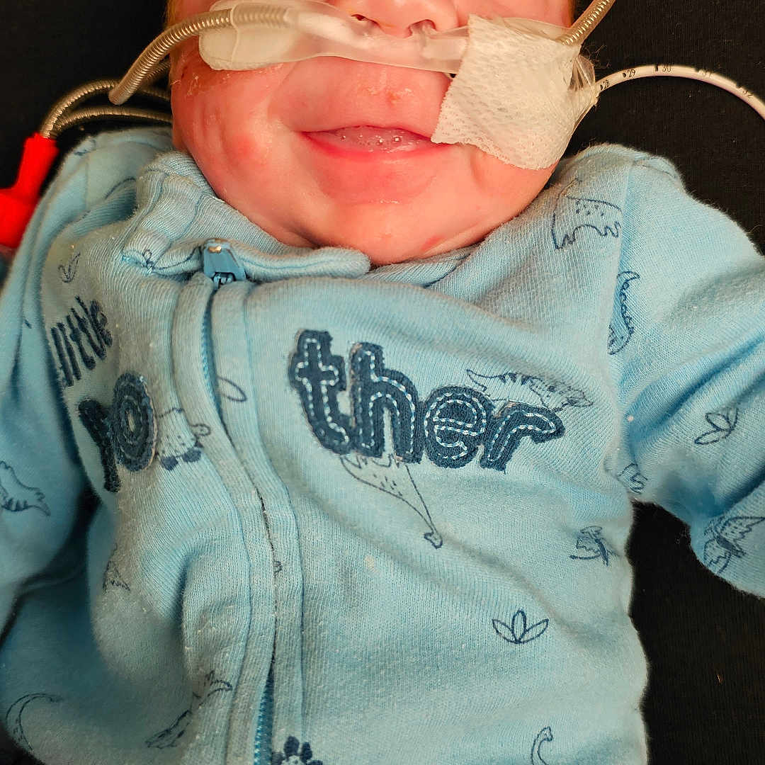 William joined the competition — help win amazing prizes! architecture, baby, building, clothing, coat, cushion, face, glove, head, homedecor, hoodie, hospital, jacket, knitwear, newborn, person, photography, portrait, sleeping, sweater