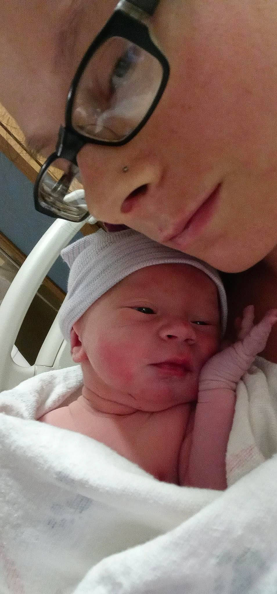 Alaiya is registered to the contest to win money with this photo: baby, cheek, child, close_up, comfort, ear, eyebrow, eyelash, eyewear, face, finger, gesture, happy, hat, lip, mouth, person, skin, thumb, toddler