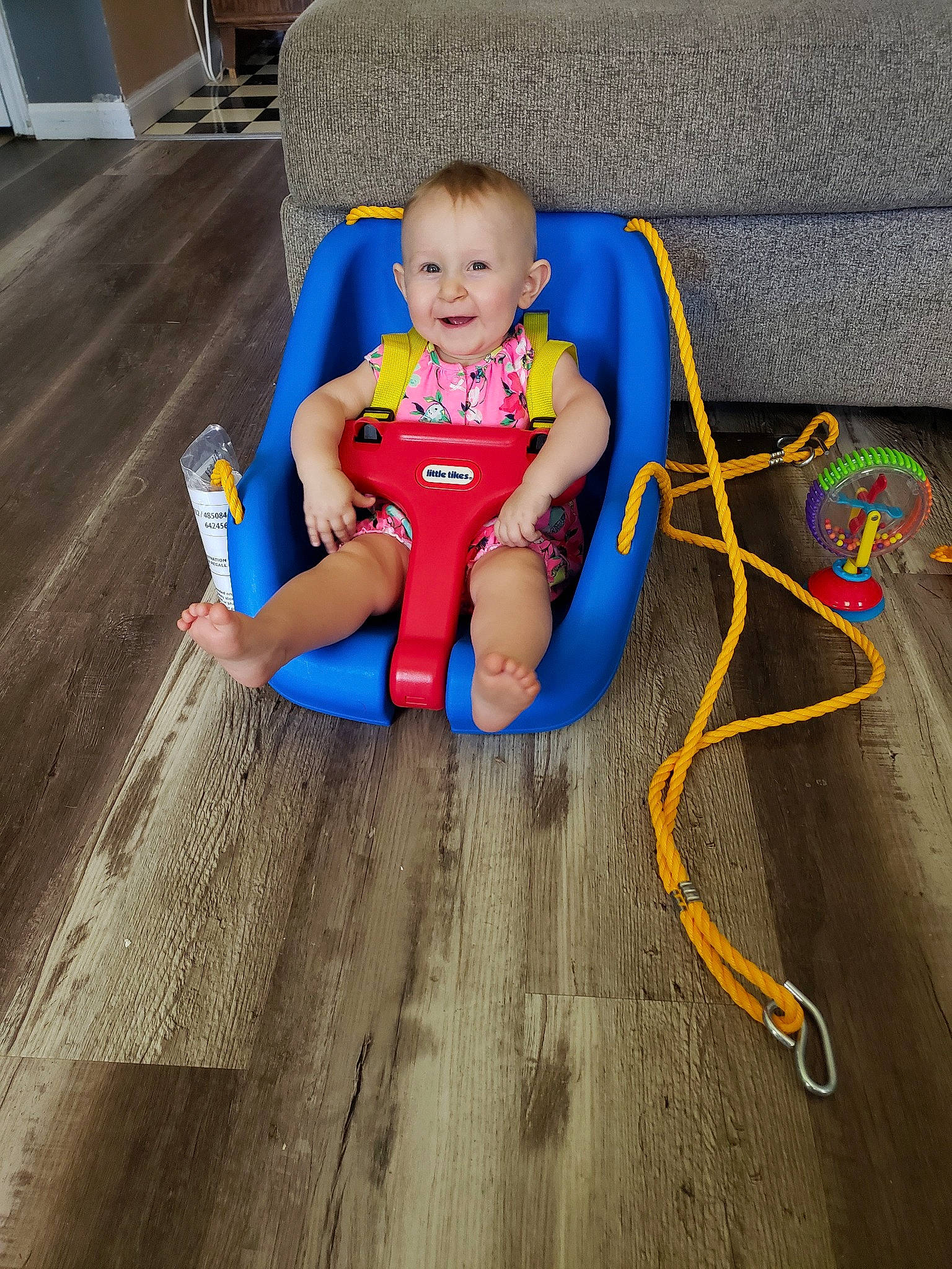Arabella is registered to the contest to win money with this photo: child, electric_blue, floor, flooring, fun, joy, leg, leisure, person, play, sitting, toddler
