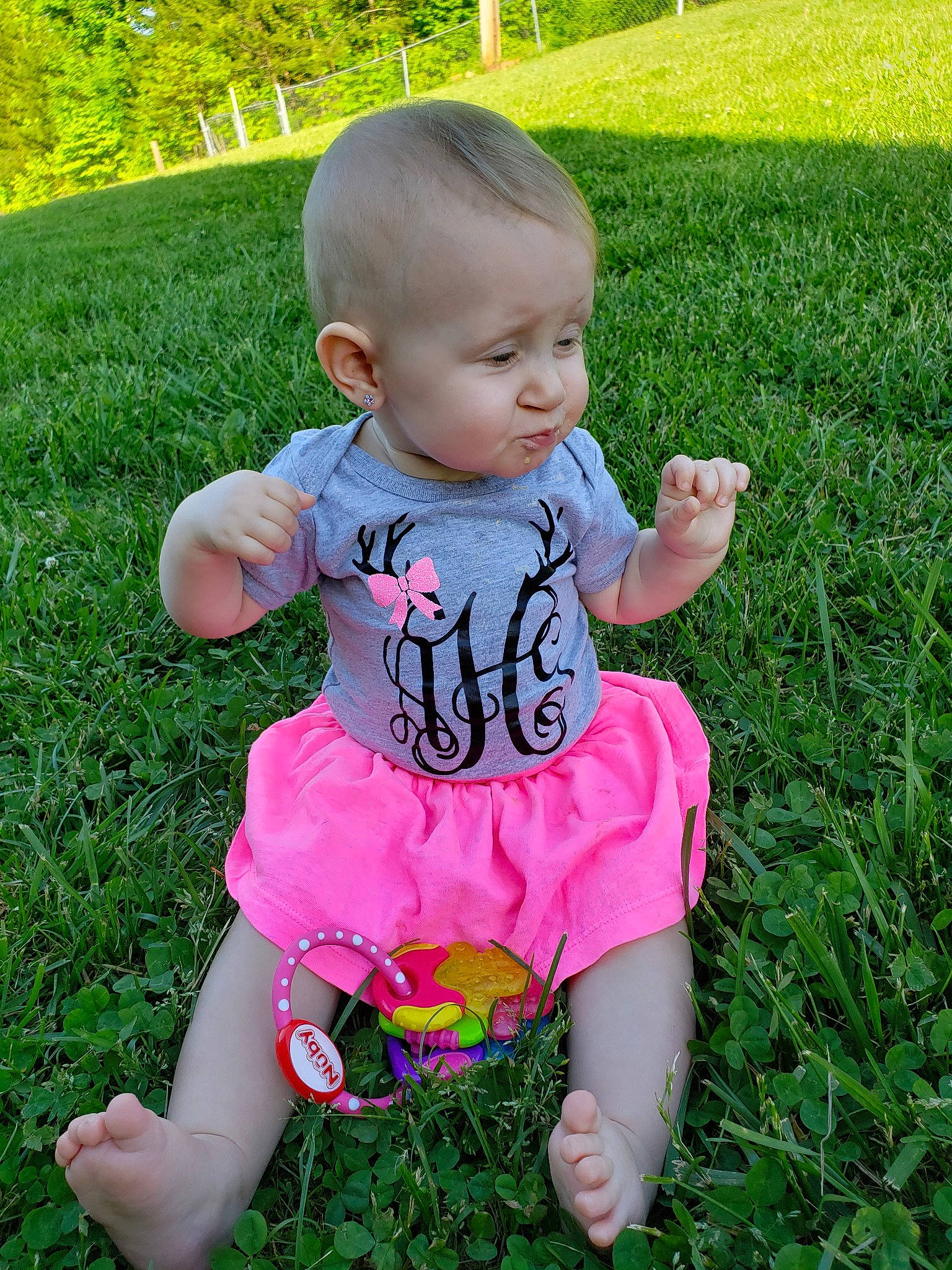 Arabella joined the competition — help win amazing prizes! baby, baby_toddler_clothing, child, finger, grass, grass_family, lawn, meadow, person, pink, plant, play, summer, toddler