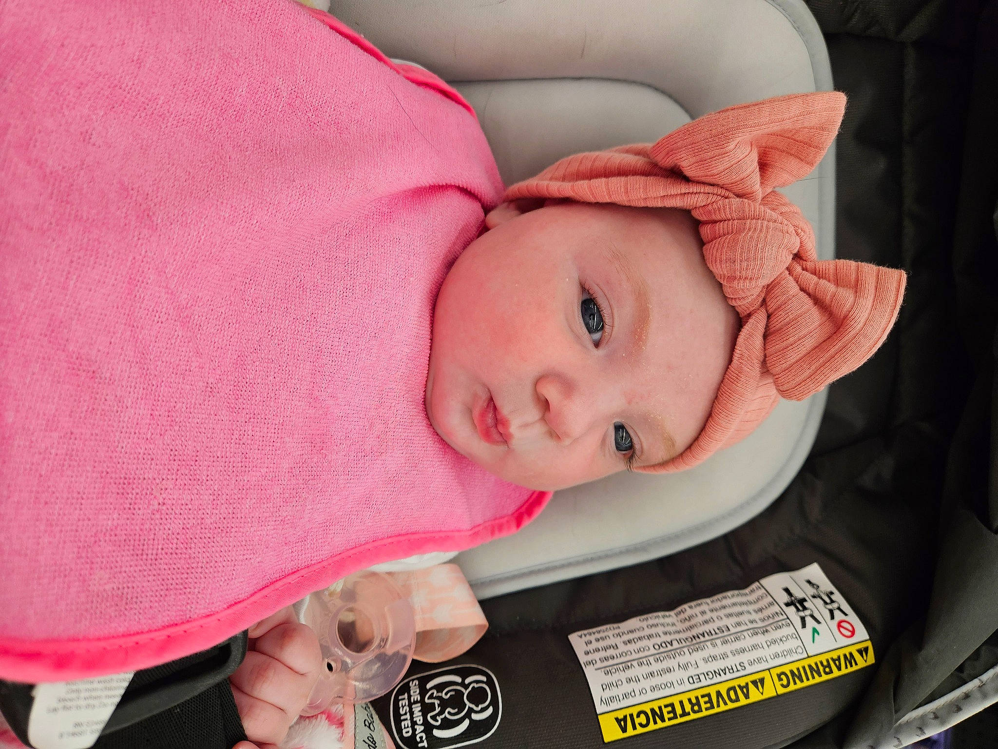 Everly joined the competition — help win amazing prizes! baby, baby_carriage, baby_products, baby_safety, baby_toddler_clothing, cheek, child, comfort, eyelash, fashion_accessory, headwear, linens, lip, magenta, nose, person, pink, room, skin, sleeve