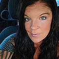 Ashlie C.