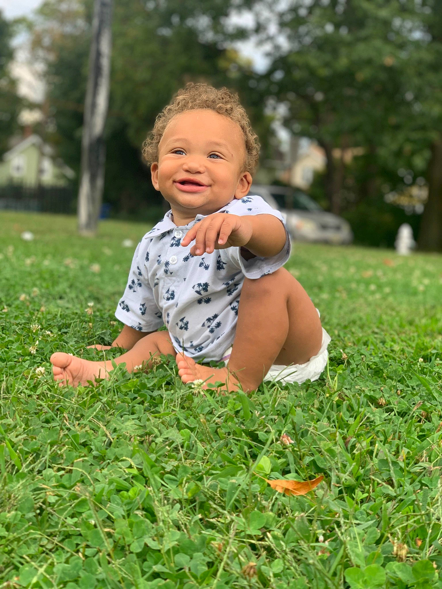 Armon is registered to the contest to win money with this photo: baby, child, finger, fun, grass, grass_family, green, happy, joy, lawn, leaf, meadow, people_in_nature, person, photography, plant, play, sitting, skin, smile