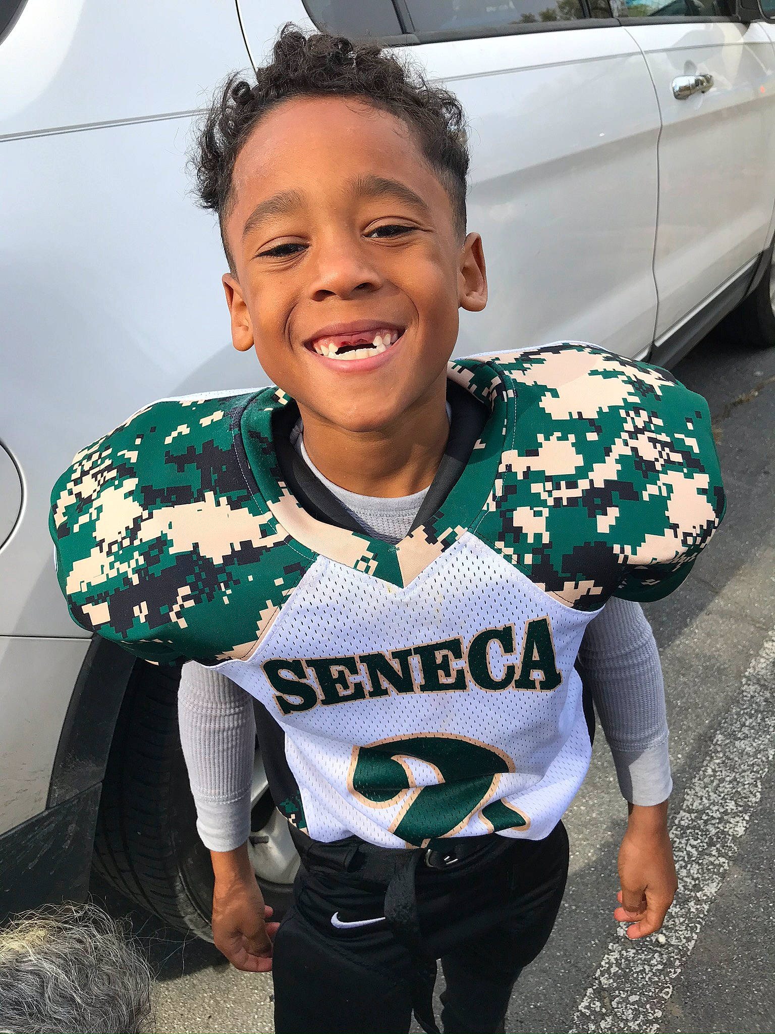 Jayvyn joined the competition — help win amazing prizes! american_football, black_hair, car, child, cool, green, happy, holiday, jacket, jersey, joy, outerwear, person, plant, smile, sportswear, style, t_shirt, team, top