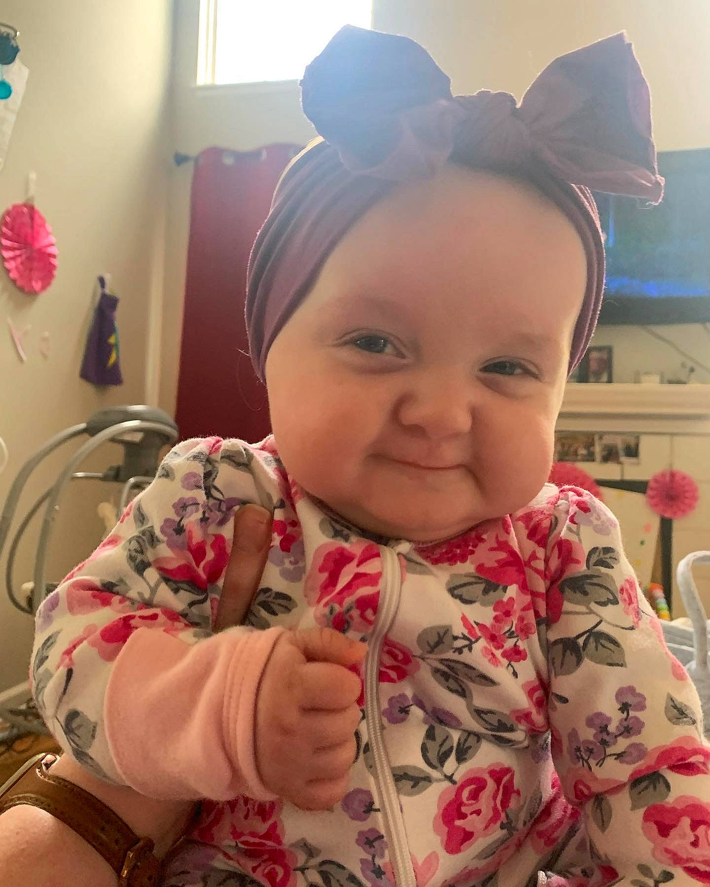 Raya is registered to the contest to win money with this photo: baby, cheek, cool, ear, eye, eyebrow, eyelash, finger, gesture, hand, happy, headwear, human_body, iris, lip, mouth, nose, person, pink, skin