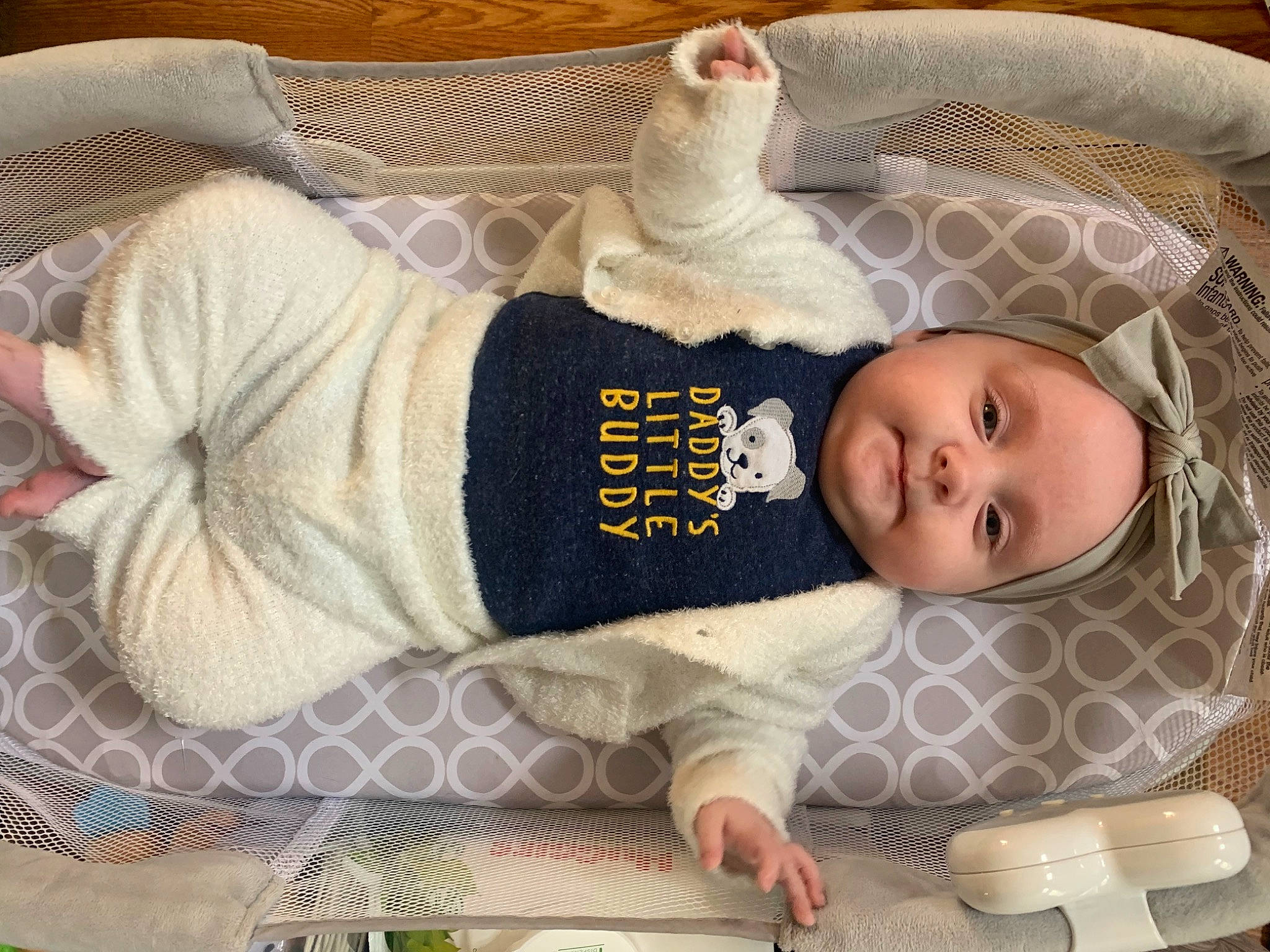 Raya is registered to the contest to win money with this photo: baby, baby_products, baby_safety, baby_sleeping, baby_toddler_clothing, bedding, bedtime, cheek, child, comfort, facial_expression, headwear, infant_bed, linens, nap, person, room, skin, sleeve, smile