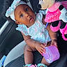 Amonii joined the competition — help win amazing prizes! baby, car_interior, car_seat, child, container, curly_hair, cute, dress, headband, indoor, infant, minnie_mouse, person, pink, playful, plush_toy, sandals, seat, toy, wide_eyes