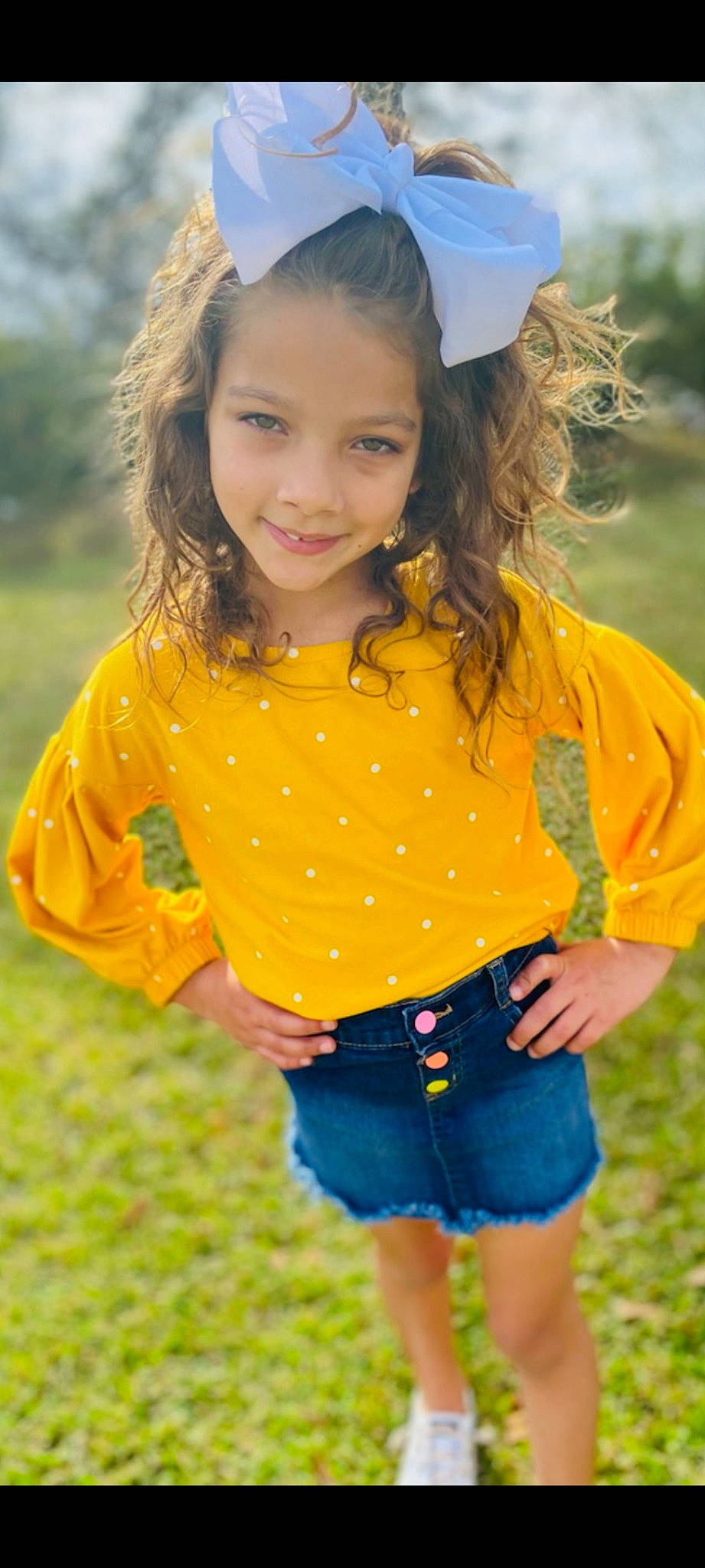 Mallie joined the competition — help win amazing prizes! beauty, child, denim, facial_expression, fun, grass, hairstyle, happy, head, joy, long_hair, nature, orange, people_in_nature, person, shorts, sleeve, smile, summer, sunlight