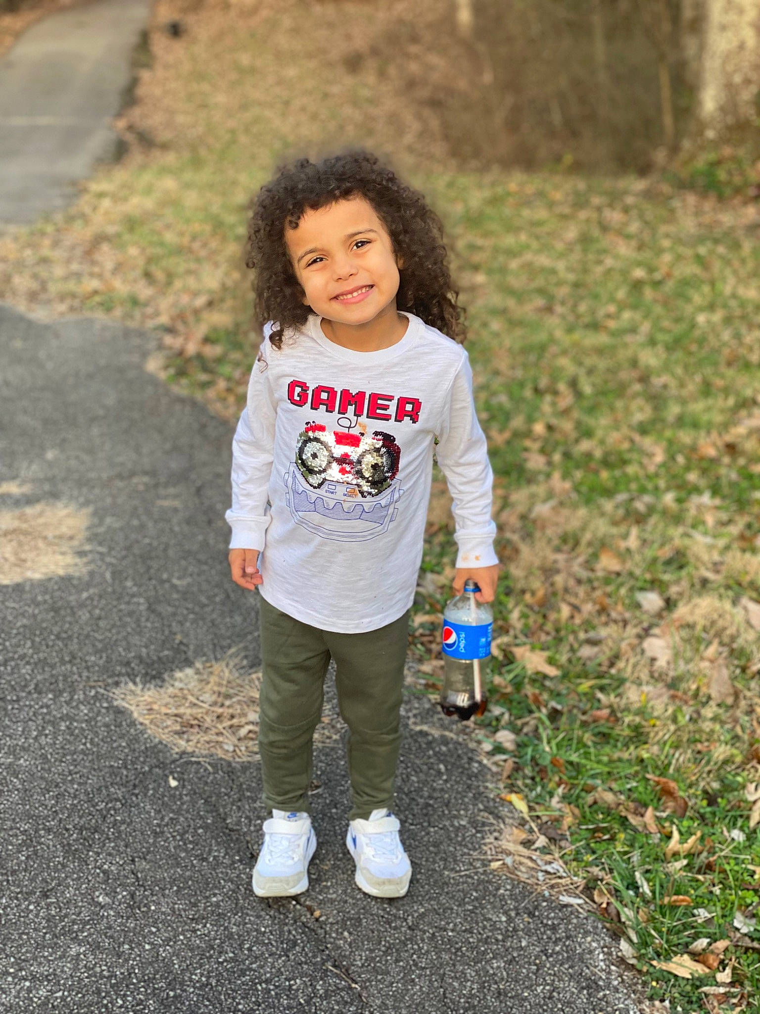 Braylen is registered to the contest to win money with this photo: asphalt, child, eye, fun, grass, grass_family, grassland, happy, head, joy, leisure, people_in_nature, person, plant, recreation, smile, soil, spring, t_shirt, toddler