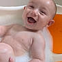 Tylan is registered to the contest to win money with this photo: baby, bath, bubbles, tub, orange, child, smile, happy, water, foam, skin, infant, cute, playful, fun, clean, head, arm, hand, sitting