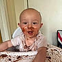 Tylan joined the competition — help win amazing prizes! baby, child, high_chair, chocolate, messy, food, smiling, face, hands, white_shirt, indoor, table, happy, cute, eating, fun, infant, tongue_out, dirt, playful