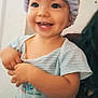 Naomie participe au concours pour gagner de l'argent avec cette photo : toddler, child, smiling, headband, indoor, happy, cute, person, baby, clothing, face, dimples, skin, eyes, hands, striped_shirt, portrait, young_child, infant, soft_light