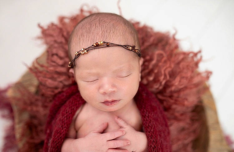 Alyson is registered to the contest to win money with this photo: baby, black_hair, eye, eyelash, face, finger, flash_photography, gesture, hand, happy, head, headgear, headpiece, headwear, iris, jewellery, lip, magenta, nail, neck