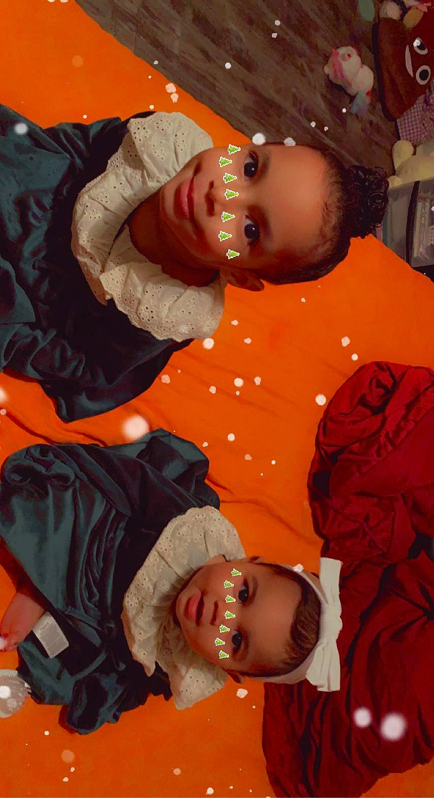 Ciara is registered to the contest to win money with this photo: baby, baby_toddler_clothing, cheek, child, comfort, event, eye, facial_expression, fun, happy, head, human_body, joy, mouth, orange, organ, person, product, red, skin