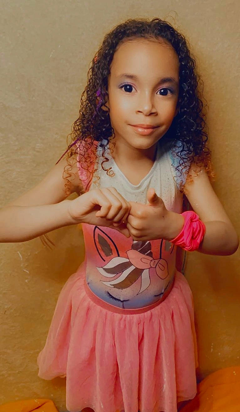 Aleviani is registered to the contest to win money with this photo: arm, dress, eye, eyelash, face, flash_photography, guitar, hair, hairstyle, hand, happy, head, joy, lip, musical_instrument, neck, organ, person, shoulder, skin