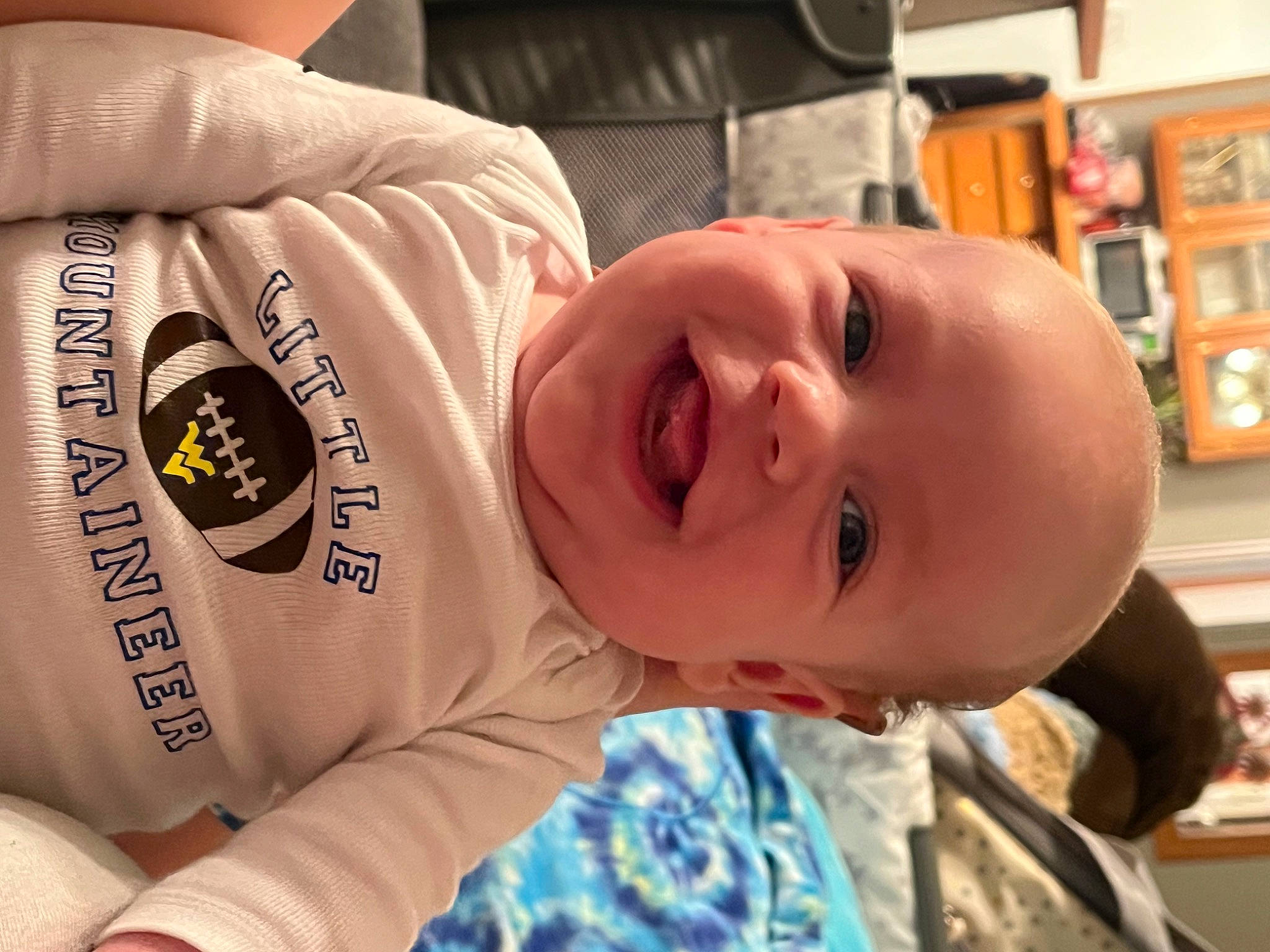 Waylon joined the competition — help win amazing prizes! baby, baby_laughing, cheek, child, chin, comfort, fun, happy, joy, leisure, mouth, muscle, nose, person, picture_frame, room, shelf, skin, sleeve, smile