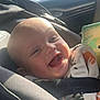 Karson joined the competition — help win amazing prizes! baby, car_seat, child, smiling, happy, infant, toy, plush_toy, sunlight, seatbelt, clothing, portrait, indoor, face, head, grinning, safety, car_interior, fabric, cute