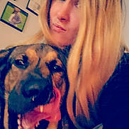 Scoob joined the competition — help win amazing prizes! woman, dog, pet, selfie, indoor, portrait, long_hair, blonde_hair, animal, face, tongue, yawn, furniture, photography, smile, home, wall_art, closeup, candid, friendship