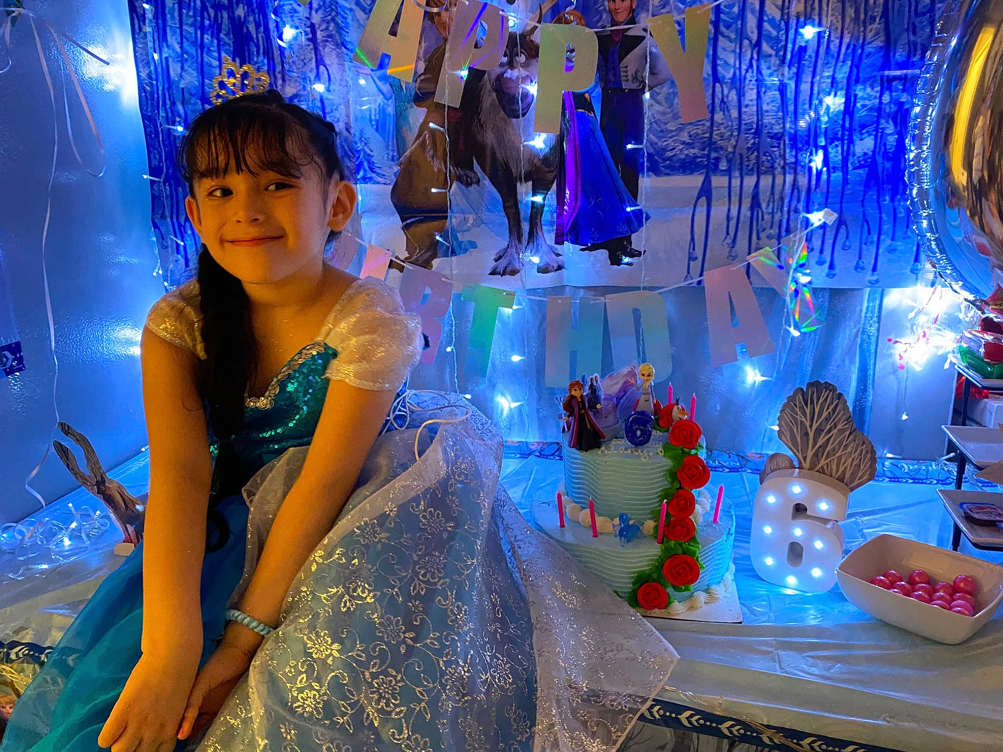 Genesis is registered to the contest to win money with this photo: black_hair, blue, christmas_decoration, christmas_ornament, decoration, electric_blue, entertainment, event, fashion, fashion_design, flash_photography, fun, happy, joy, leisure, light, lighting, magenta, ornament, person